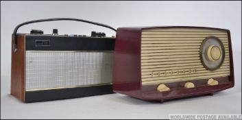 A Roberts R707 portable radio together w