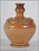 A Doulton stoneware glazed miniature vas