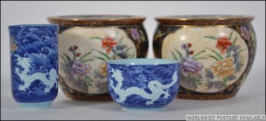 A pair of Chinese miniature carp bowls,