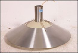 A stunning 1970's retro polished metal l