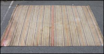 A large 20th century floor rug by Habita