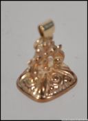 A hallmarked 9ct gold and bloodstone wat