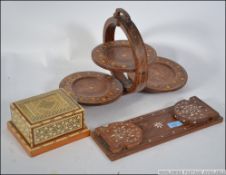 A good wooden inlaid book trough togeth