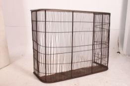 A Victorian brass and wire work club fir