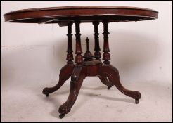 A Victorian tilt top mahogany loo / brea