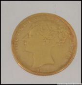 A Victorian 1854 shield back full sovere