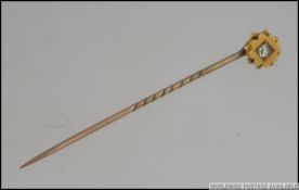 A Victorian 9ct gold and diamond stick p
