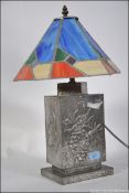 A Tiffany style lamp, having a leaded st