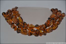 Amber style glass bead necklace, 6 strin