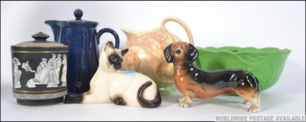 A vintage Sylvac jug, Beswick leaf patte