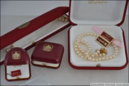 A collection of boxed cultured pearl jew