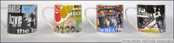 A collection f unused advertising mugs p