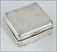 A silver hallmarked table top cigarette