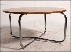 A vintage circular coffee table with tea