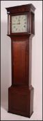 A 19th century oak crossbanded longcase