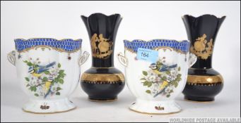 A pair of Limoges cobalt blue ground wit