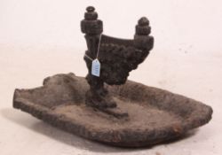 A Victorian cast and wrought iron boot s