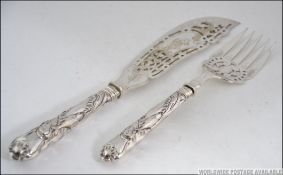 Hallmarked silver handled Fish Servers w