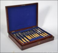 An Edwardian mahogany cased canteen of c