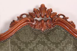 A 20th century cared hardwood sofa sette