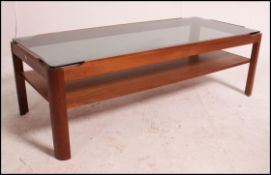 A vintage mid century teak coffee table