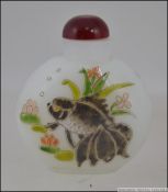A Chinese oriental reverse glass painted