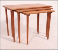 A 1970's retro Danish style teak nest of