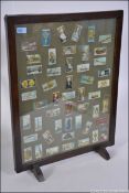 CIGARETTE CARDS: A 1940's oak framed fir