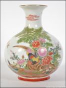 A 20th century Chinese bulbous vase deco