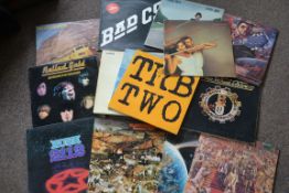 A collection of vinyl long play records