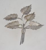 A large silver hallmarked Charles Horner flower lea spray brooch bearing Chester hallmarks for