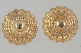 A pair of early 20th century 9ct gold earrings with post fasteners and butterfly backs.