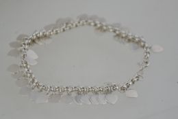 A contemporary silver ladies charm bracelet.