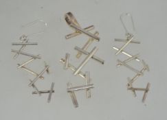 A silver 925 Ashley Pittman Tego & Co necklace pendant and matching earring set. Stamped.