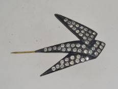 A 1930's Art Deco black bakelite figural hat pin in the form of a swallow bird set with paste
