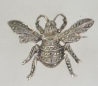A large vintage silver figural bug brooch pin in the form of a bumble bee set with marcasite with