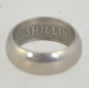 A vintage ring made from a 1950's two shilling coin.
