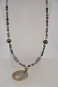 A contemporary agate necklace, possibly Chinese of graduating form,