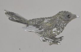 A vintage Sarah Coventry figural brooch in the form of a bird with roller clasp.