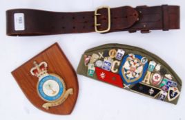 MILITARIA: Assorted military related items to include a Russian forage cap with various badges and