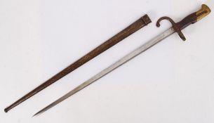 BAYONET: A Victorian c1887 pattern French bayonet. With original scabbard. 65cm long.