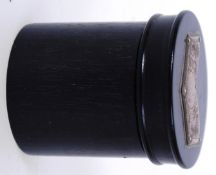 EBONY & SILVER POT: An unusual early 20th century ebony wood carved cylindrical pot with screw top.
