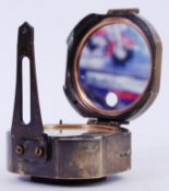 COMPASS: A vintage brass cased Stanley Of London military related compass. 8cm diameter.