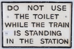 RAILWAY: A reproduction 20th century cast iron Railway related signpost sign advising of Toilet