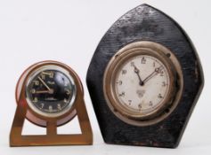 CAR CLOCKS:A Smiths car clock circa mid 20th century being mounted in wooden plinth together with a