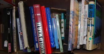 MILITARY BOOKS: Two boxes of assorted military and related books - various titles and topics to