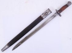 BAYONET: A 1907 pattern German rifle bayonet, with scabbard.