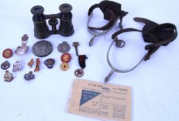 MILITARIA: A collection of items to include a pair of vintage opera glasses,
