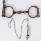 POLICE: An original pair of Victorian Hiatt ' D ' shaped Police handcuffs,