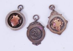 FOB MEDALS: A collection of three vintage hallmarked silver fob medals,